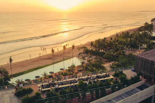 Potato Head Beach Club Bali iconic facade with sunset beachfront view