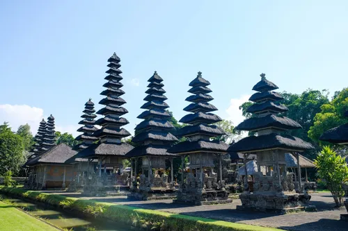 Taman Ayun Temple Bali with multi tiered meru towers surrounded by garden and moat